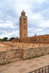 Photo of the exterior of the Koutoubia mosque in the city of Marrakech, cloudy day.