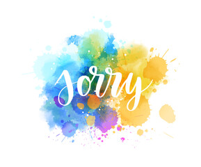 Sorry - handwritten modern calligraphy lettering on abstract watercolor paint splash background. Yellow and blue colored. Apology concept illustration.