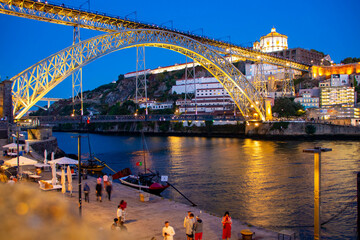 Dom Luis bridge and Douro riverbank in Porto