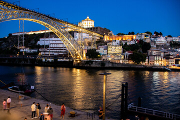 Dom Luis bridge and Douro riverbank in Porto