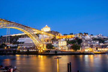Fototapeta na wymiar Dom Luis bridge and Douro riverbank in Porto