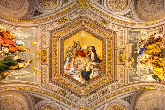 Vatican City - February 24, 2023: Ceiling painting in the Gallery of the Candelabra by Ludwig Seitz of Saint Thomas Aquinas offering his works to the Roman Catholic Church, Vatican City, Rome, Italy