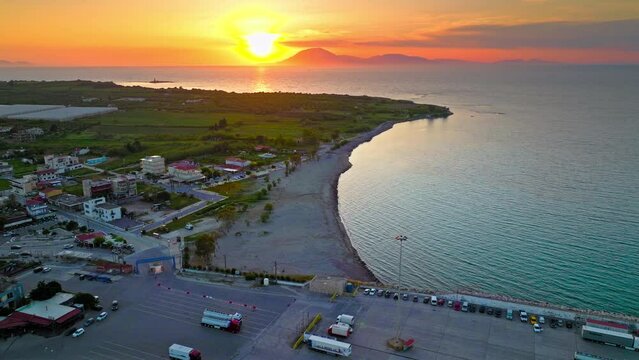  Aerial view of a golden sunset over Port Killini, ferry service in Kyllini. The largest port in the Ionian Sea and the third in Greece, the port connects the mainland with Zakynthos and Kefalonia.