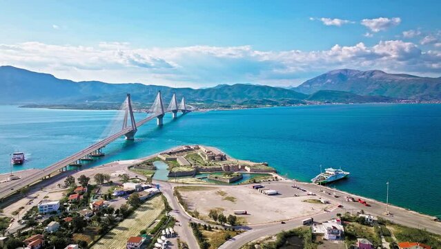 Aerial view of the historical old Rio Fortress Castle in Greece. Patras, Greece. Rio Fortress. The Rio-Antirrio Bridge. Officially the Charilaos Trikoupis Bridge. Bridge over the Gulf of Corinth.