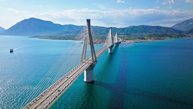 Aerial view of Charilaos Trikoupis Rio-Antirrio Bridge, the world's longest multi-span cable-stayed bridges. The longest of the fully suspended type crosses the Gulf of Corinth, Patras with ferries.