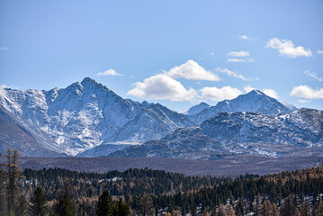 Fototapeta premium Mountain landscape. Mountains covered with snow.