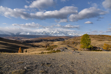 Altai Republic. North Chuysky ridge. Mountains covered with snow during sunrise. Mountain landscape.