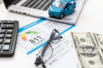 Credit report with score on a desk