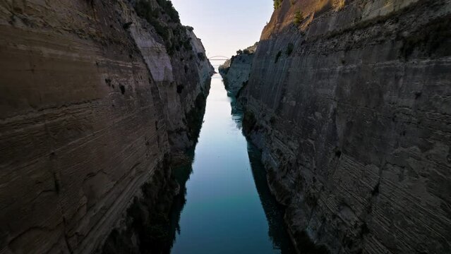 Aerial view of The Corinth Canal in Greece an international maritime hub. An artificial waterway built in Greece connects the Gulf of Corinth with the Aegean Sea.