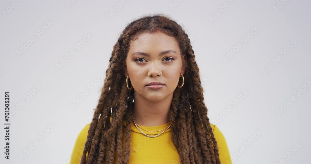 Sticker Woman, face and serious in studio, confident facial expression with pride isolated on white background. Casual, portrait and mockup space with young model, looking assertive and proud with power