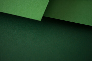 Green 3d abstract background, colored paper, copy space
