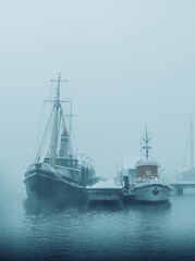 boats moored on a cold day