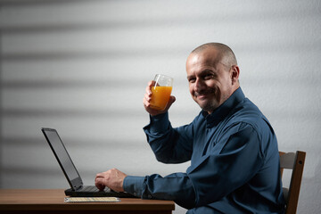 Businessman with a glass of orange juice