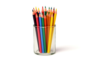 Colored pencils stand in a glass with the point upwards on a white background