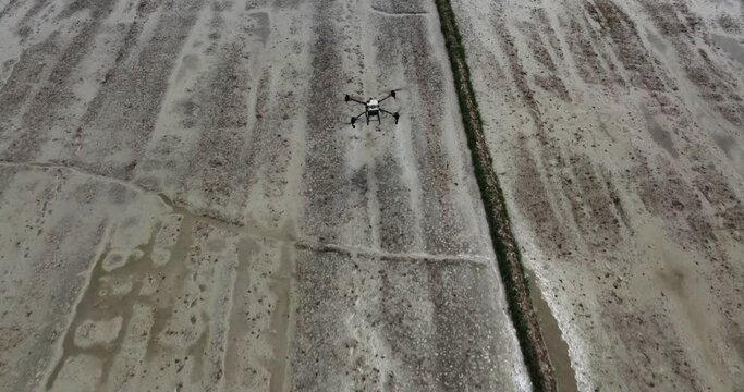 agricultural drone works in field