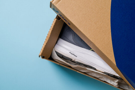 Antalya, Turkey - November 28, 2023: Asics running shoes with new technology soles in shoe box