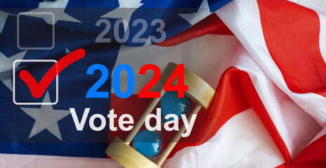 Presidential Election 2024 text on a mini chalkboard over a vintage background with part of the American Flag. Top view. - obrazy, fototapety, plakaty