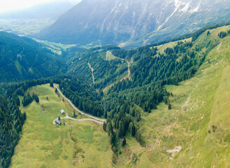 Top panorama view to the Berchtesgaden green landscape with curved roads