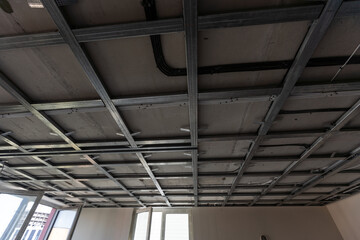 structure of ceiling suspension, installation of gypsum plasterboard and light.