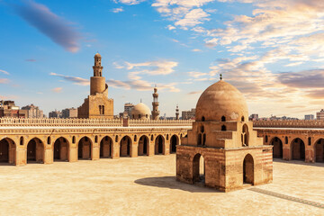 Minaret and ablution fountain of the Ibn Tulun Mosque, colourful view of old Cairo, Egypt