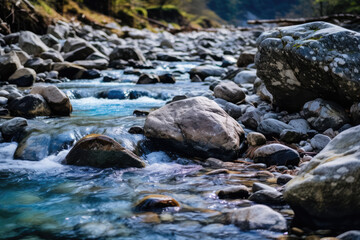 Beautiful mountain landscape with a mountain river and rocks in the foreground