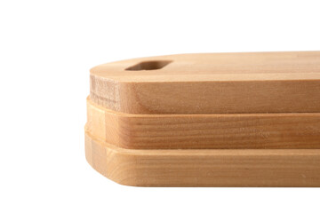 Close-up of the edges of three wooden cutting boards on a white background.