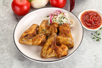 Grilled chicken wings with sauce