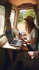 Person working on a laptop in a picnic setting , person, laptop, picnic setting.