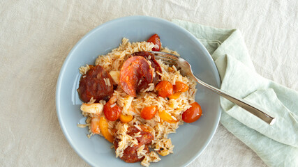 plate of basmati rice with shrimp and chorizo on the table