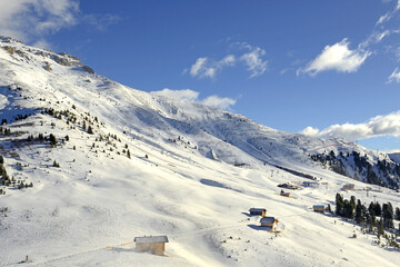 Fototapeta na wymiar Ski Center Latemar – Obereggen, Pampeago, Predazzo. Dolomiti Superski, Val di Fiemme, Italy