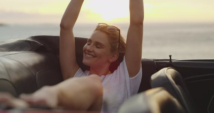 Woman, road trip and relax at sunset by sea in car with drive for holiday, adventure and travel outdoor. Transport, wind and ocean with vacation, freedom and nature with a female driver in a vehicle