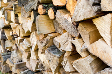 stacked chopped firewood..