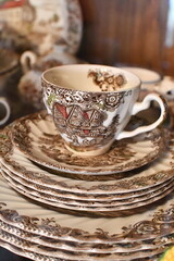 Cup and Plates with Elegant Design Pattern