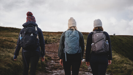 group of people hiking in mountains