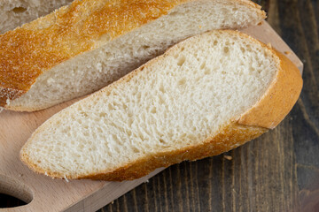wheat loaf of bread close-up on the table