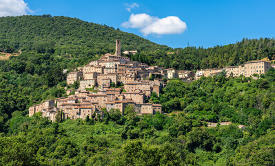 The beautiful village of Castelnuovo Val di Cecina on a sunny summer morning. Province of Pisa,...