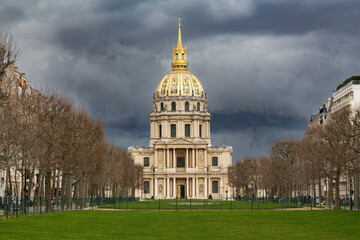 Sunlight hits the golden dome of Les Invalides, built under Louis XIV in 1677 to house invalids of...