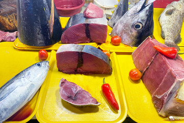 Fresh tuna fish at a fish market in Asia. Cut fish