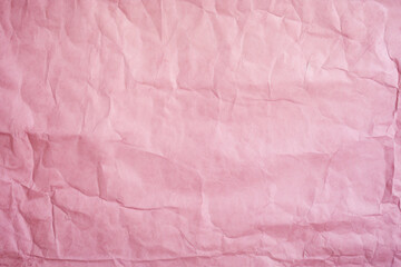 Blank pink recycled paper, crumpled texture background, rough vintage page