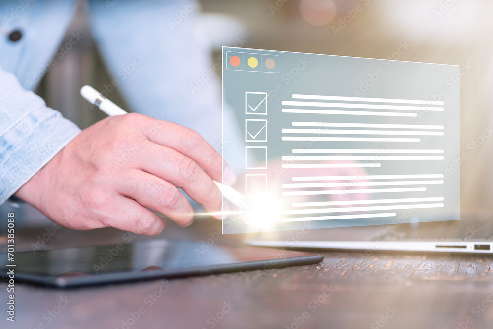 Poster Checklist. Businessman checking mark on the check boxes with marker. Business performance monitoring concept, businessman using tablet and laptop Online survey filling out, digital form checklist.