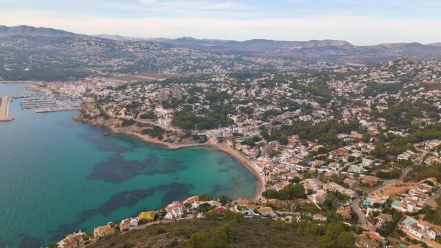 Aerial drone video of the coastal town named Moraira in the Costa Blanca, Spain
