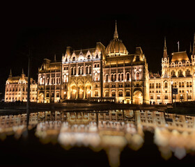 Fototapeta na wymiar Budapest Parliament at night and reflection. Hungary