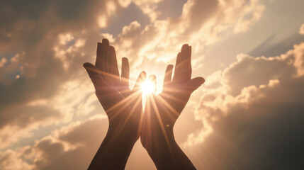 Two hands reaching upwards towards the sunlight - obrazy, fototapety, plakaty