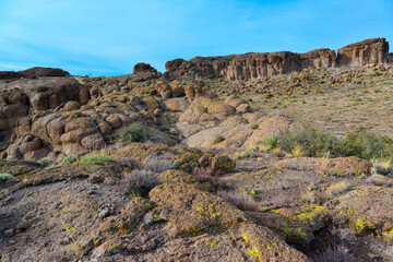 Mountain erosion formations of red mountain sandstones, Desert landscape with cacti, Arizona