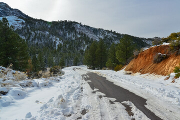 Snowy mountains and snow along the road on a mountain pass in the Death Valley area