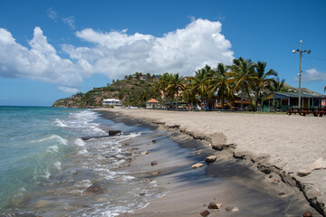 A view along the sandy Caribbean beach of Frigate Bay - 701417447