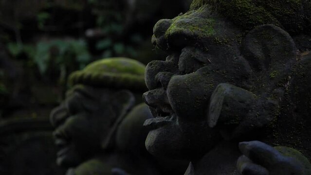 Hd slow motion footage of balinese god statue in Monkey forest, Ubud, Bali, Indonesia.
Mid angle, parallax movement.