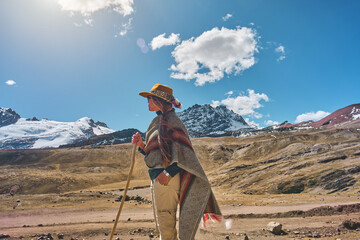 Woman with A Lama Flock in The Andes Of Peru (near By Cusco)