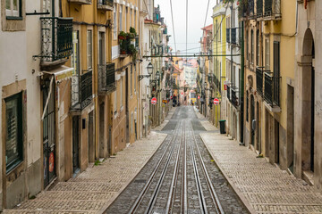 Fototapeta premium Lisbon, Portugal - Novmber 26th 2023: View of the Bica street funicular