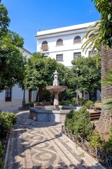 Fototapeta na wymiar A traditional private Moorish-style courtyard with a fountain in Cordoba, Spain